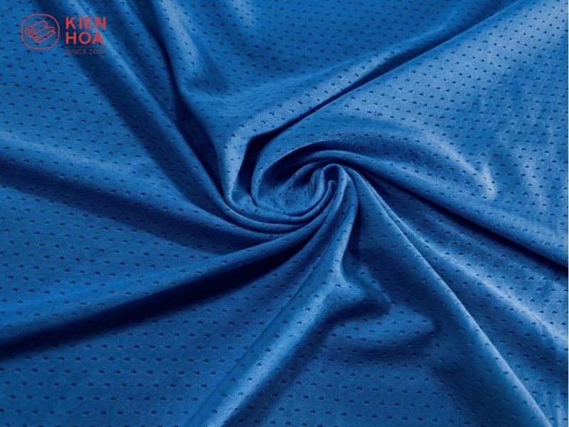 Bề mặt vải thun mè với các hạt lỗ nhỏ li ti giúp thoáng khí